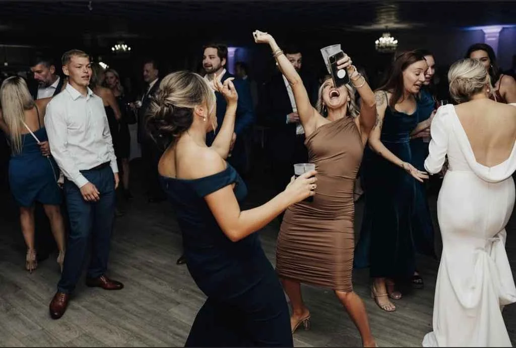 People fill the dance floor at Magnolia Valley Weddings & Events wedding reception.
