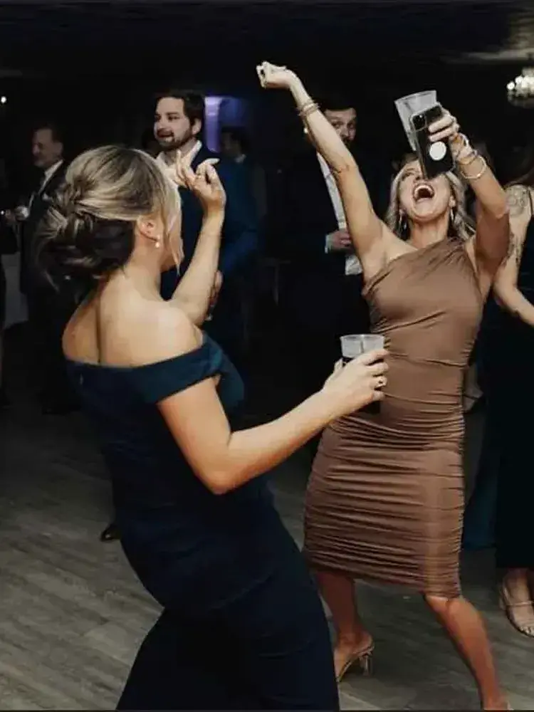 People fill the dance floor at Magnolia Valley Weddings & Events wedding reception.