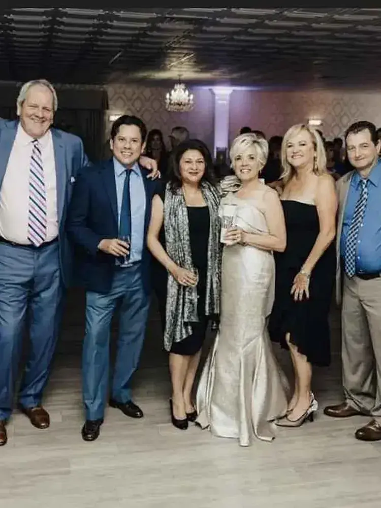 Magnolia Valley Weddings & Events guests gather inside the venue during a wedding celebration.