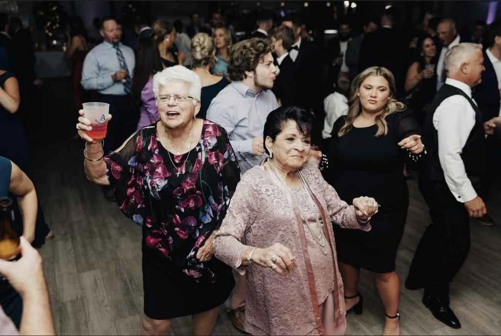 Guests dance together at Magnolia Valley Weddings & Events wedding reception in New Orleans.