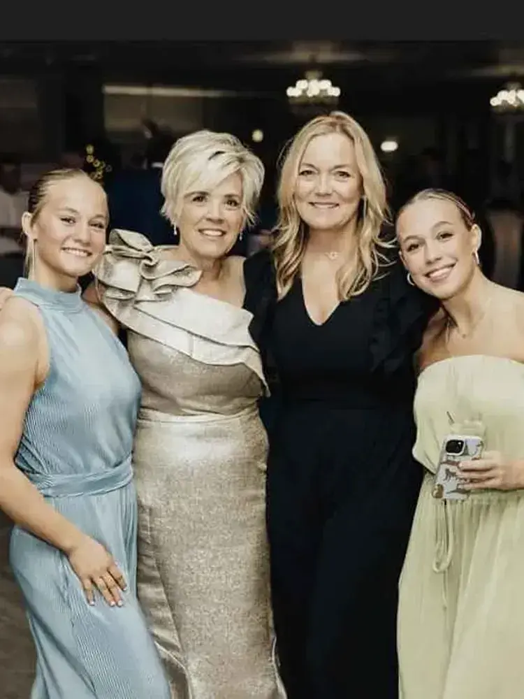 Magnolia Valley Weddings & Events group of women pose for a photograph during a wedding celebration.