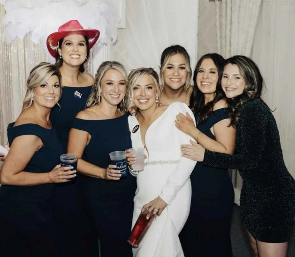 Magnolia Valley Weddings & Events group of women pose together for a wedding photo.