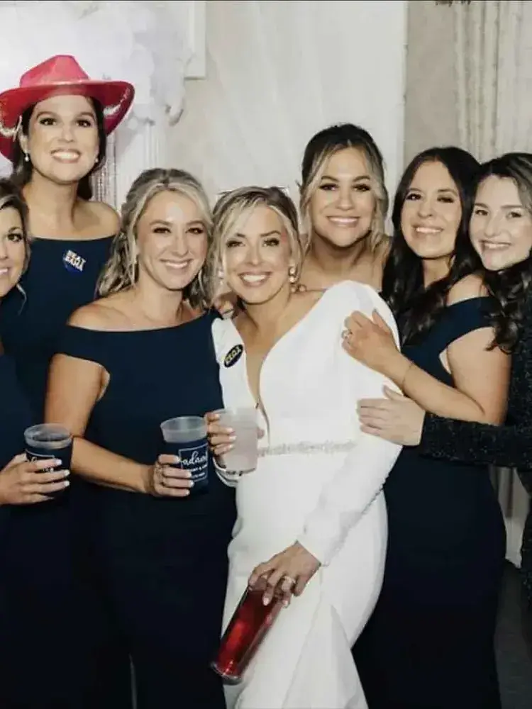 Magnolia Valley Weddings & Events group of women pose together for a wedding photo.